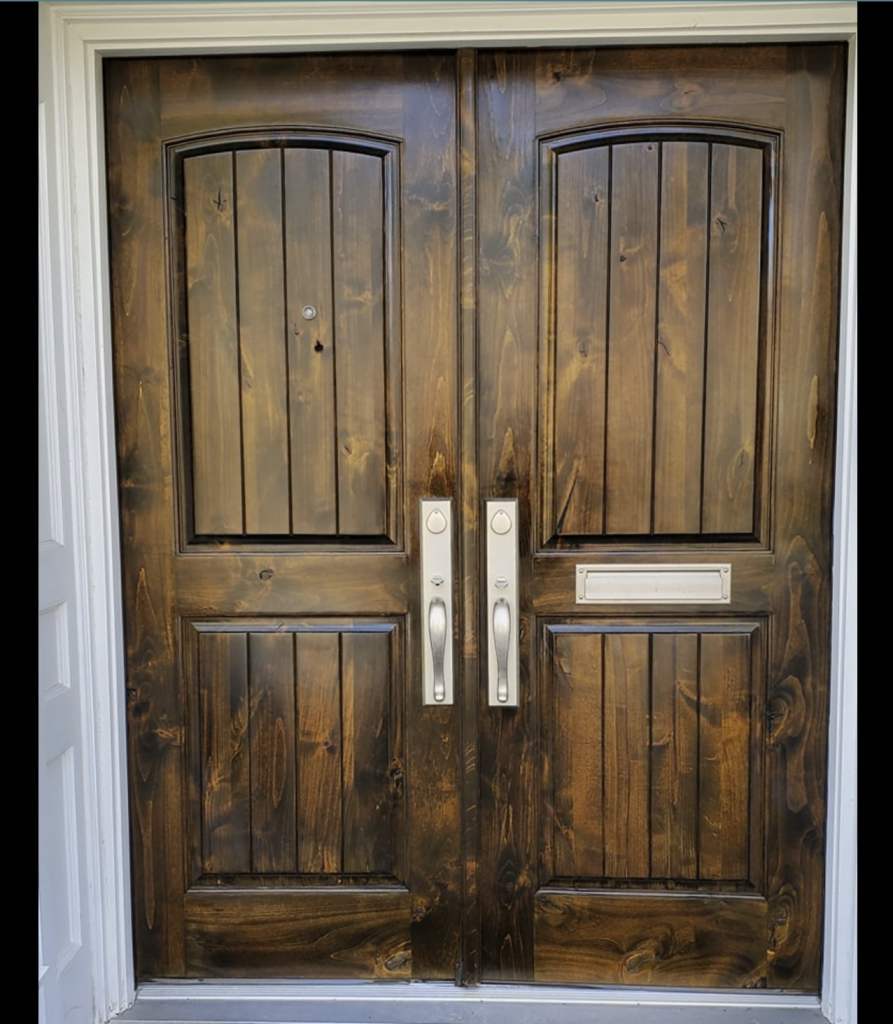 Front door repair and refinish by Kirk Furniture and Cabinetry Restoration Houston Texas